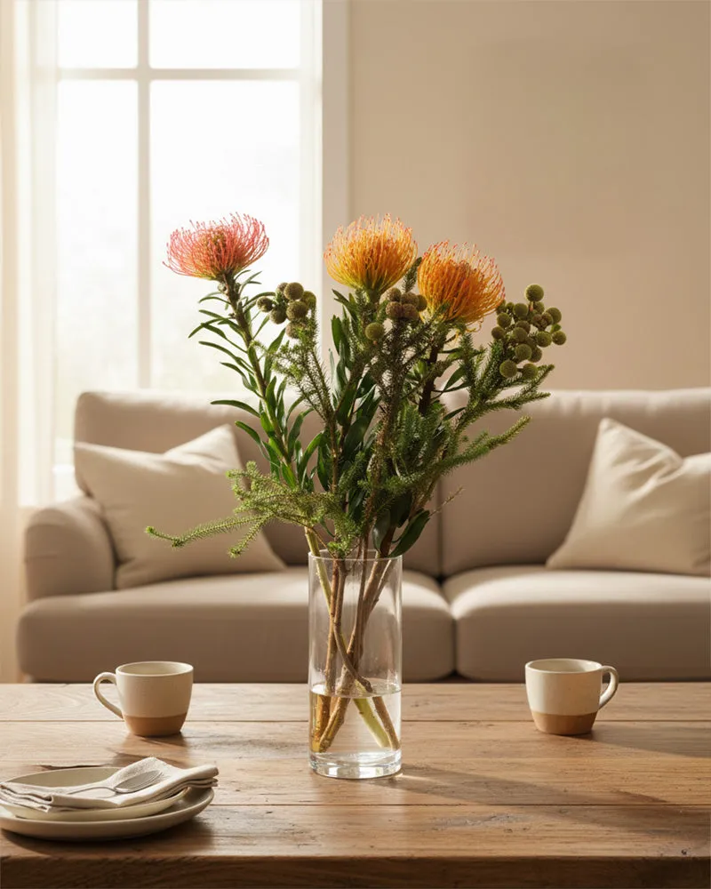 feey-rilio-couture-blumenstrau-leucospermum-orange image 1